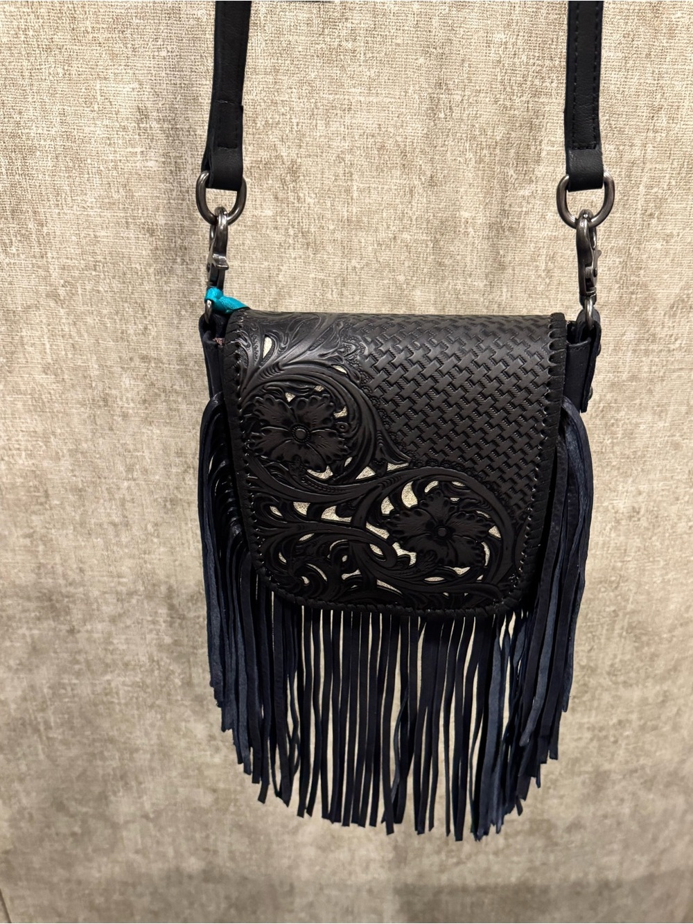 Women's Black Fringe Crossbody Bag with Floral Tooled Detail